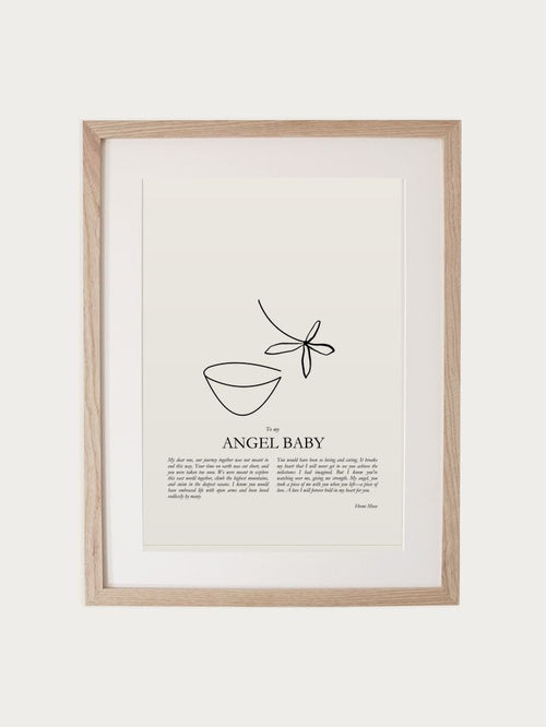 Angel Baby print in oak frame
