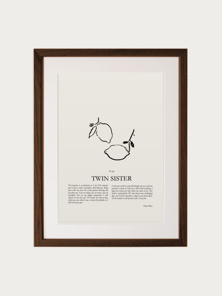 Twin Sister print in walnut frame